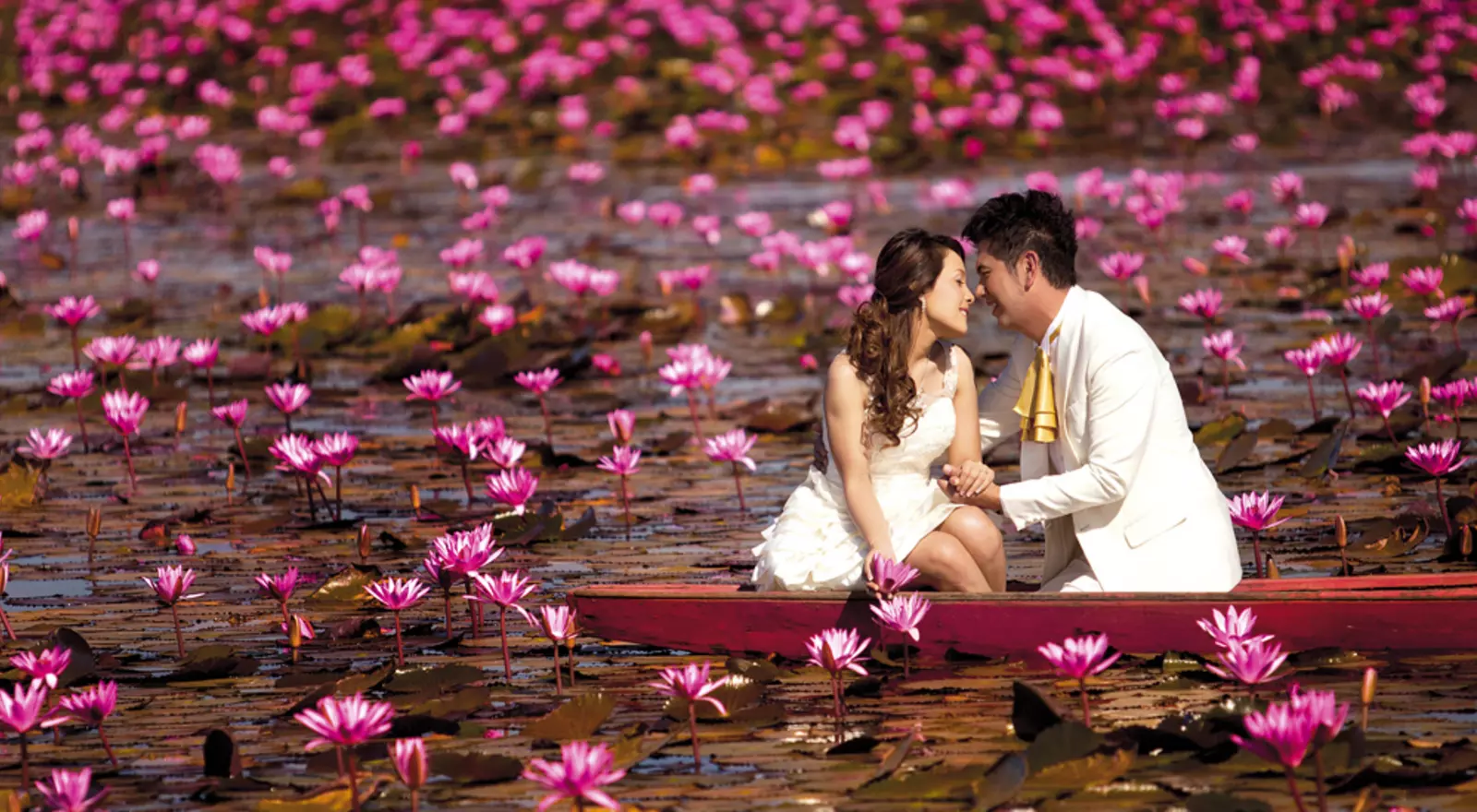 Couple sharing a peaceful moment by a lake